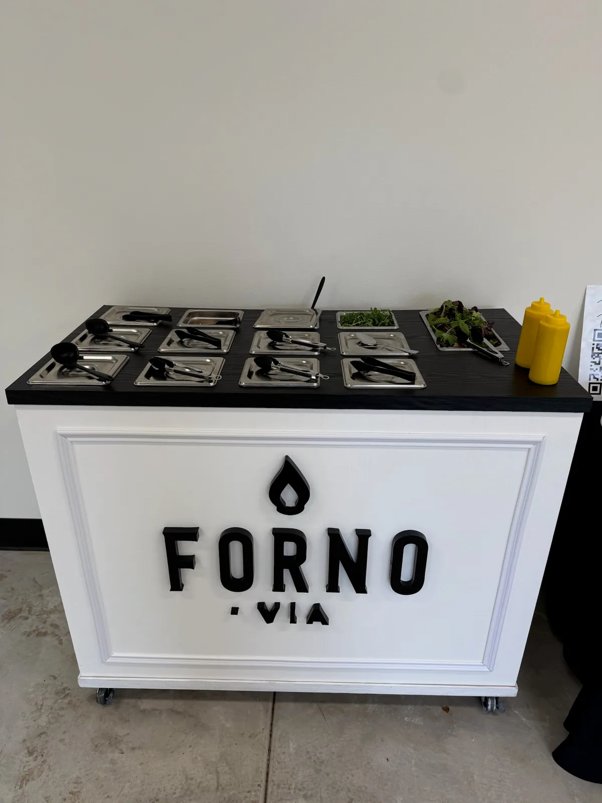 Forno Via branded mobile salad bar prepared for guest service